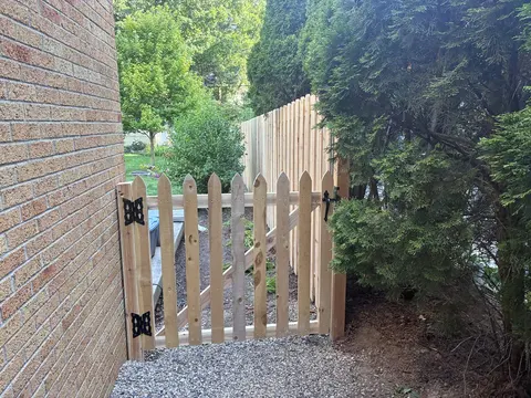 Wood picket fence and gate