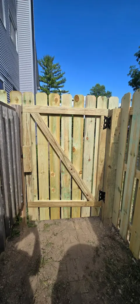 Shadowbox wood fence and gate