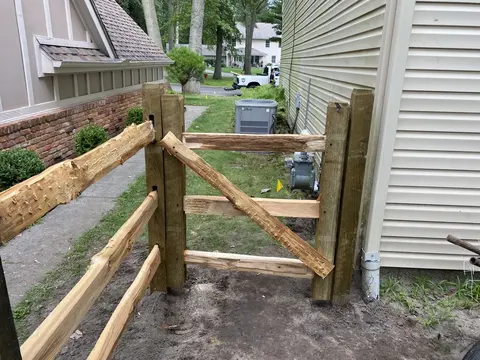 Wood rail fence and gate