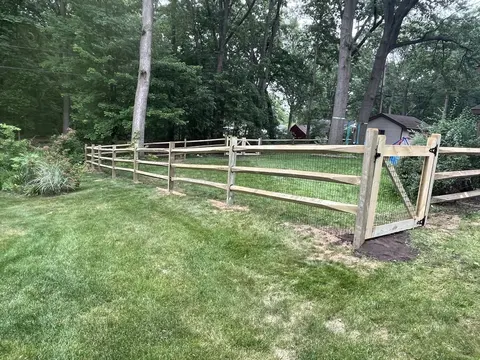 Wood rail fence and gate