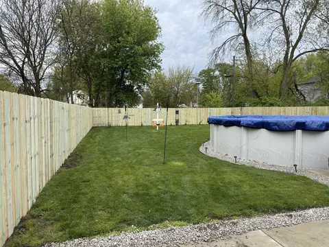 Board-on-board wood privacy fencing