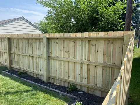 Wood privacy fence, viewed from the rail side