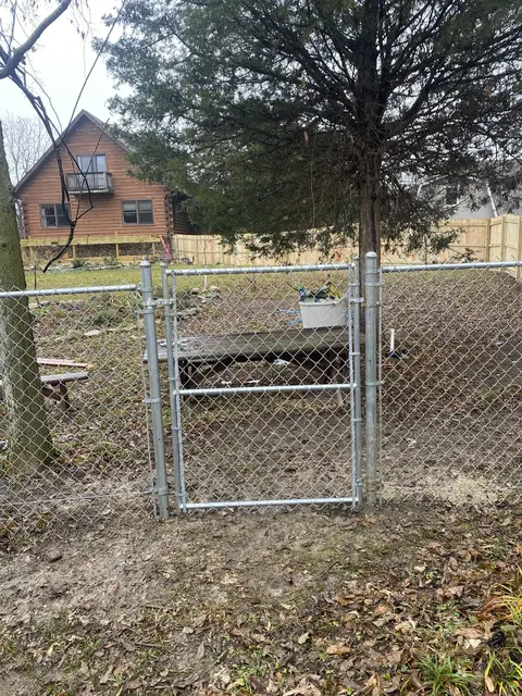 Chain-link fence and gate