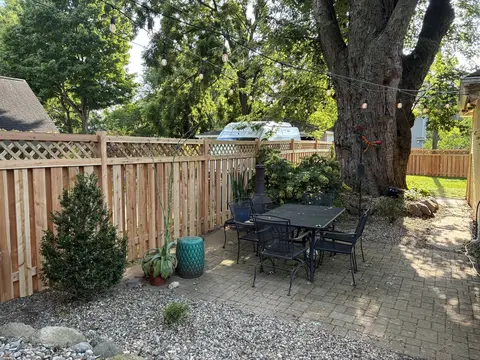 Wood privacy fence with lattice above the boards