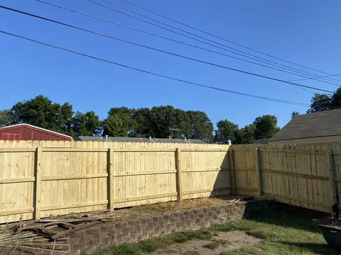 Wood privacy fence, viewed from the rail side