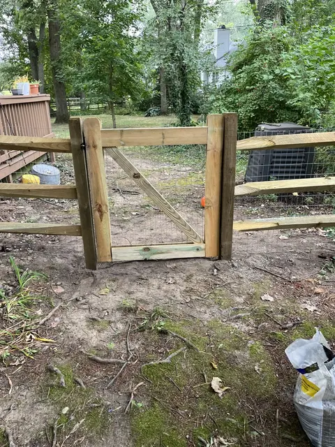 Wood rail fence and gate