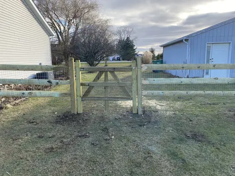 Wood rail fence and gate