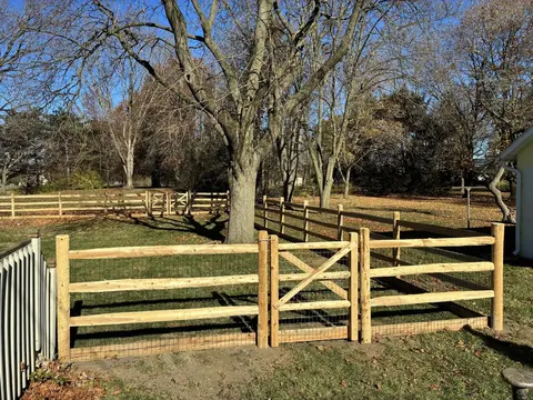 Wood rail fence and gate
