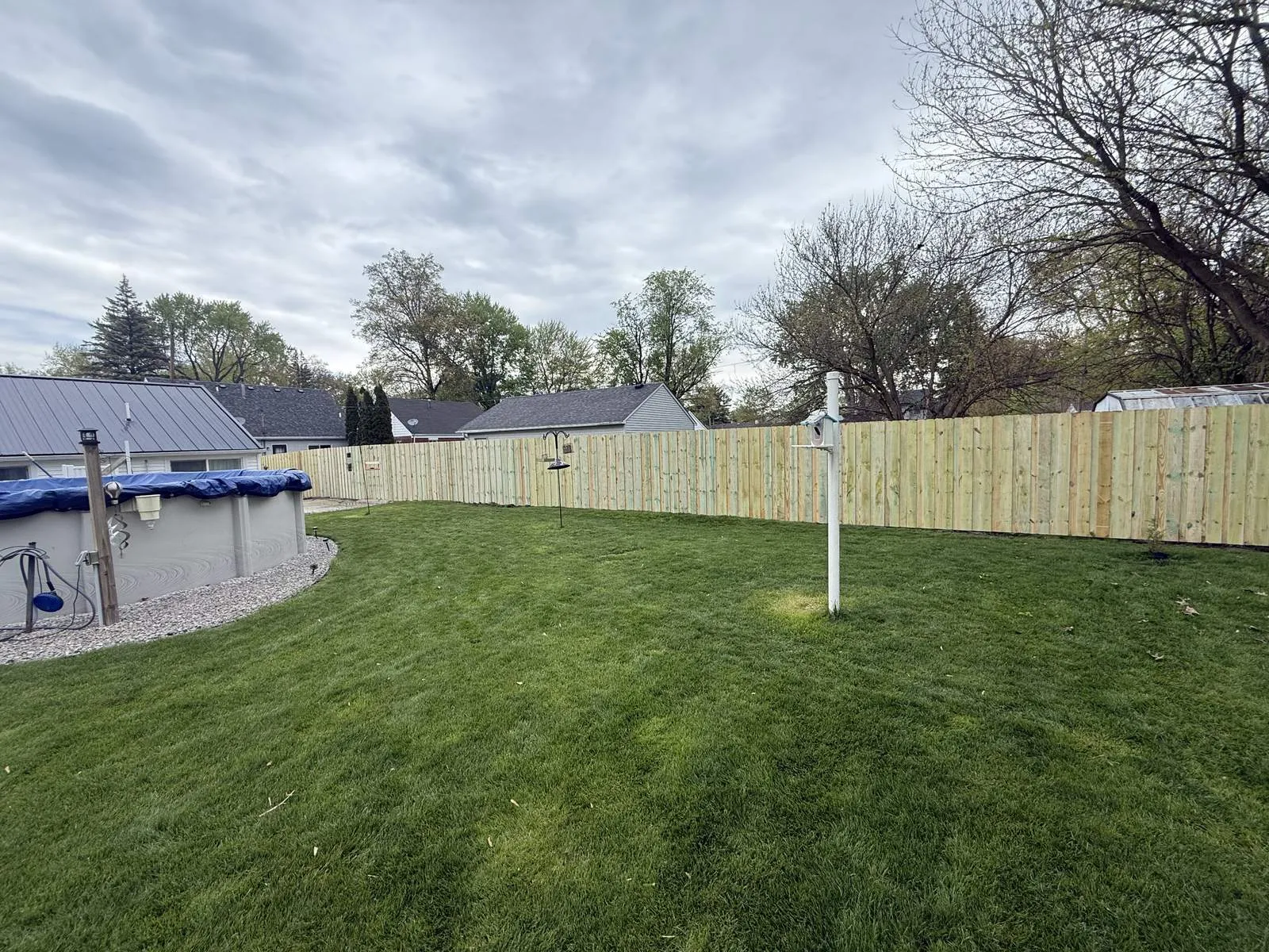 Pine privacy fence around a Toledo pool yard