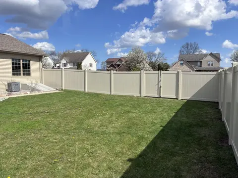 Tan privacy vinyl fencing