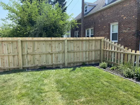 Wood fencing with a change in height