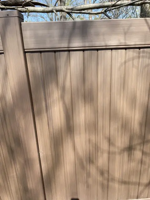 Woodgrain privacy vinyl fencing