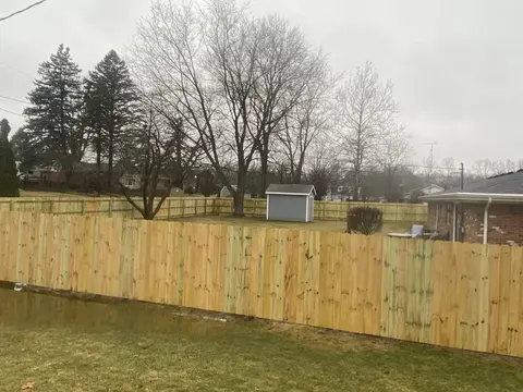 Wood fencing with a change in height
