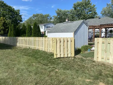 Shadowbox wood fence and gate