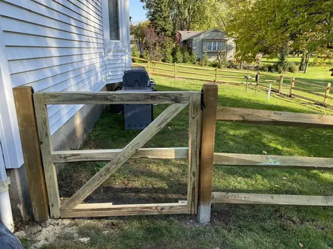 Wood rail fence and gate