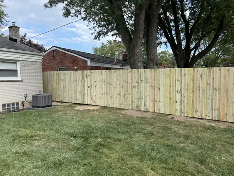 Pressure-treated privacy fence, long run