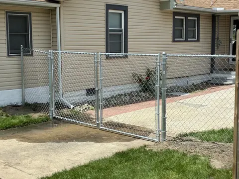 Chain-link driveway gate