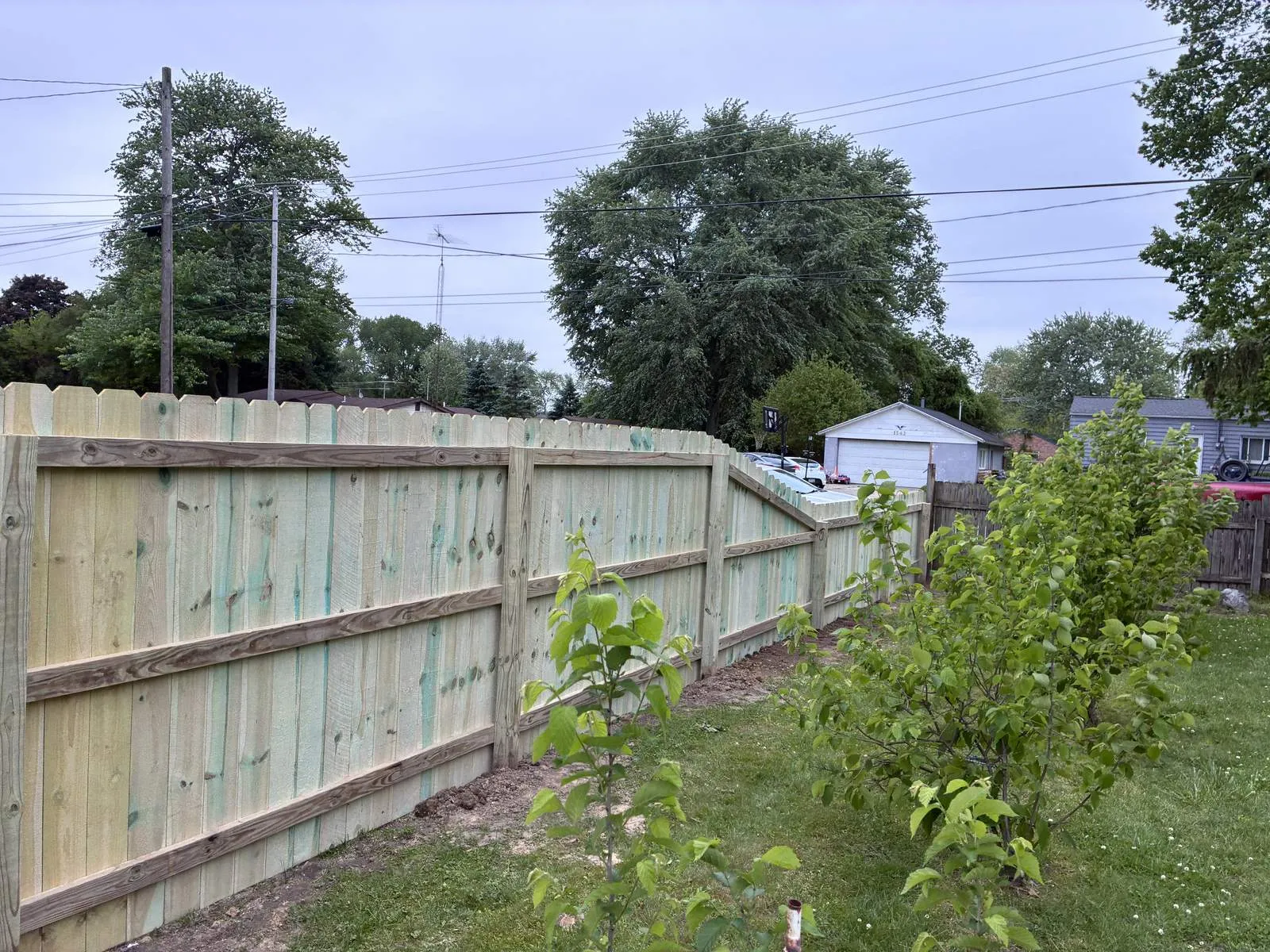 Privacy fence following a grade change on a Toledo yard