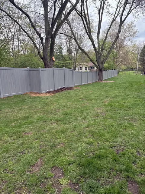 Gray privacy vinyl fencing