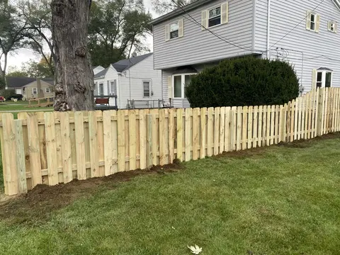 Wood fencing with a change in height