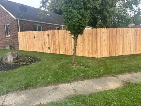 Cedar dog-ear privacy fence with walk gate
