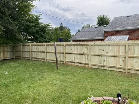 Wood privacy fence, viewed from the rail side