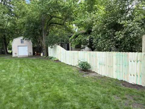 Wood fencing with a change in height