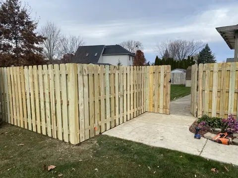 Shadowbox wood fence and gate