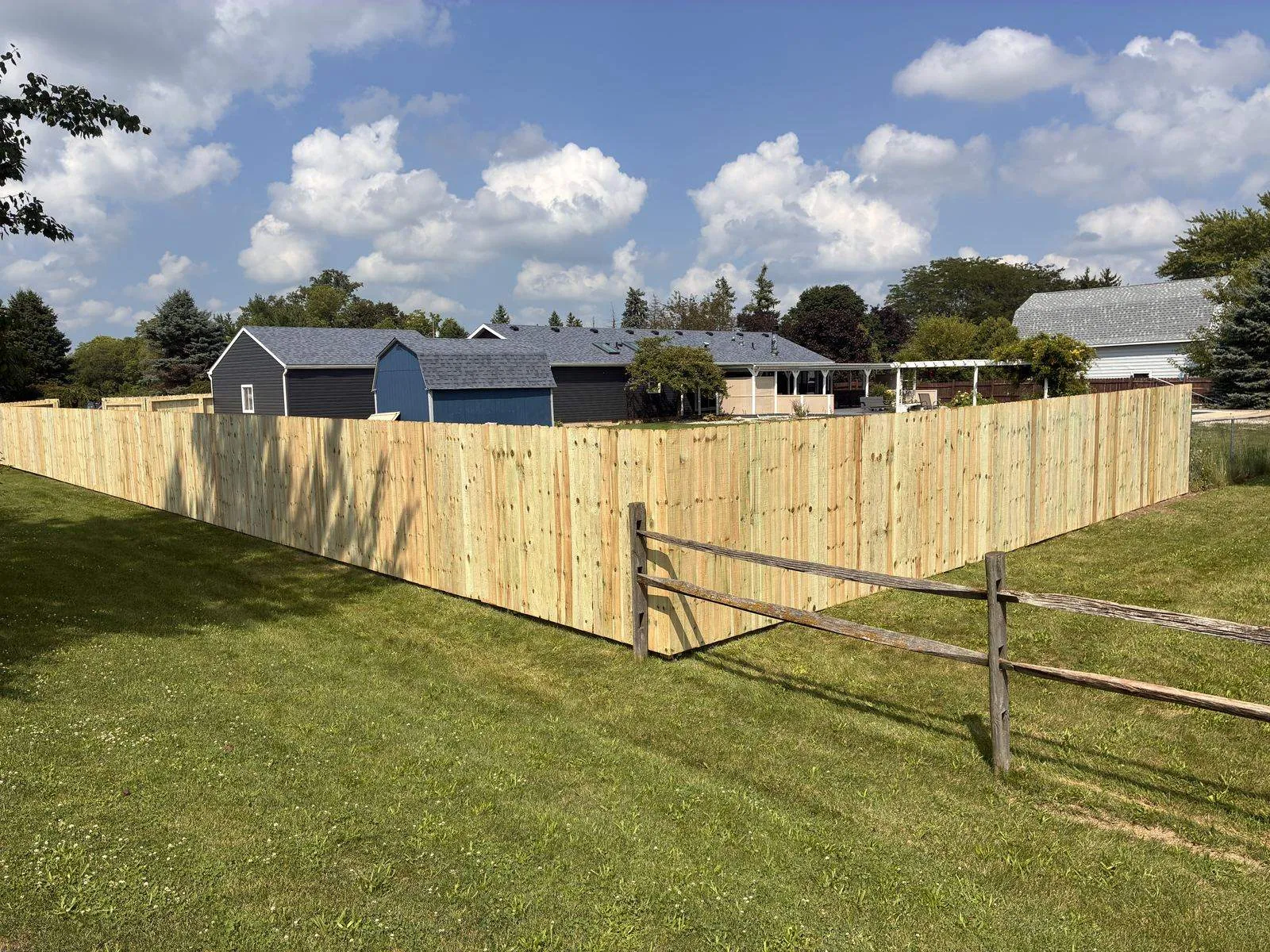 Complete yard privacy enclosure by Ghareeb Fencing Solutions
