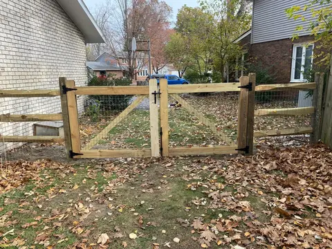 Wood rail fence and gate
