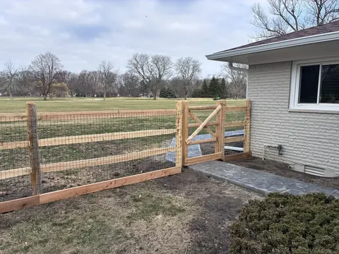 Wood rail fence and gate